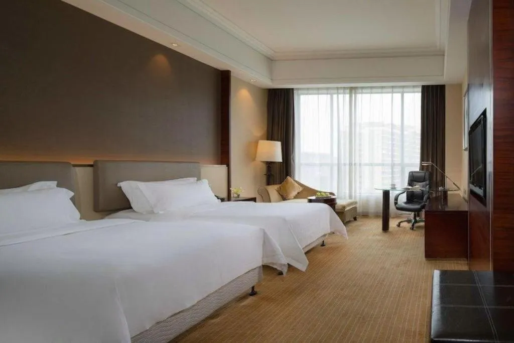 Bed in Venus Royal Hotel Shenzhen International Exhibition Center