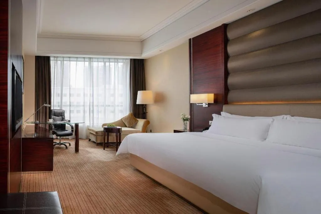 Bed in Venus Royal Hotel Shenzhen International Exhibition Center