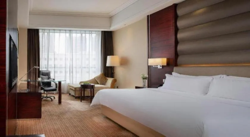 Bed in Venus Royal Hotel Shenzhen International Exhibition Center