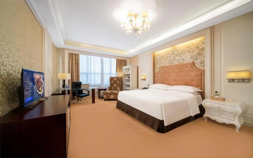 Bed in Venus Royal Hotel Shenzhen International Exhibition Center