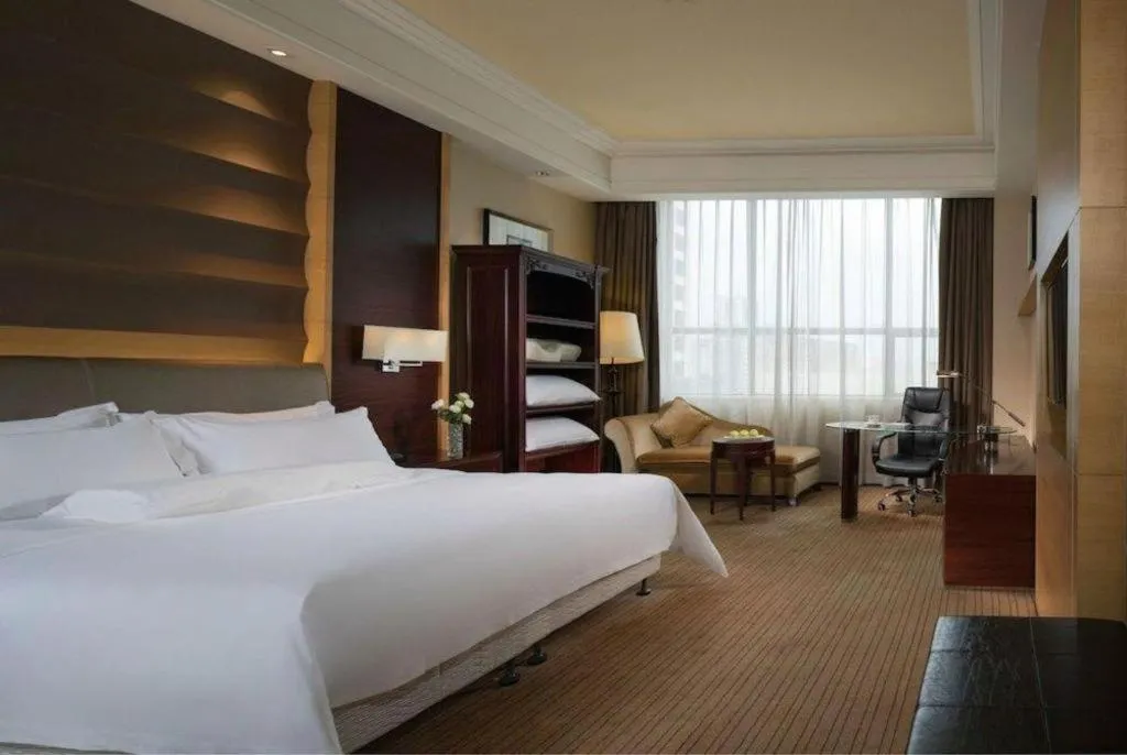 Bed in Venus Royal Hotel Shenzhen International Exhibition Center