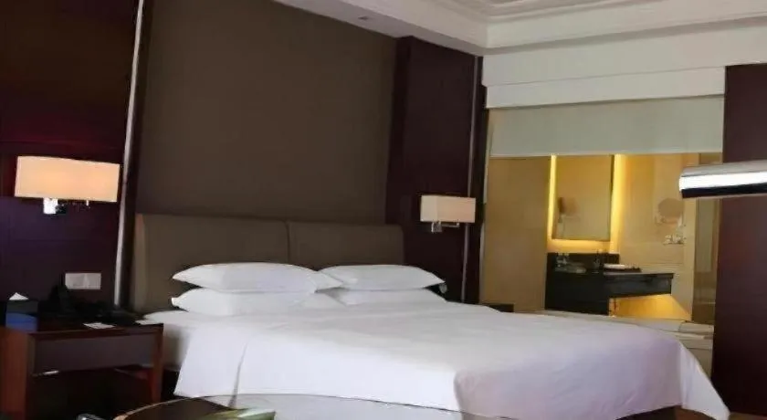 Bed in Venus Royal Hotel Shenzhen International Exhibition Center