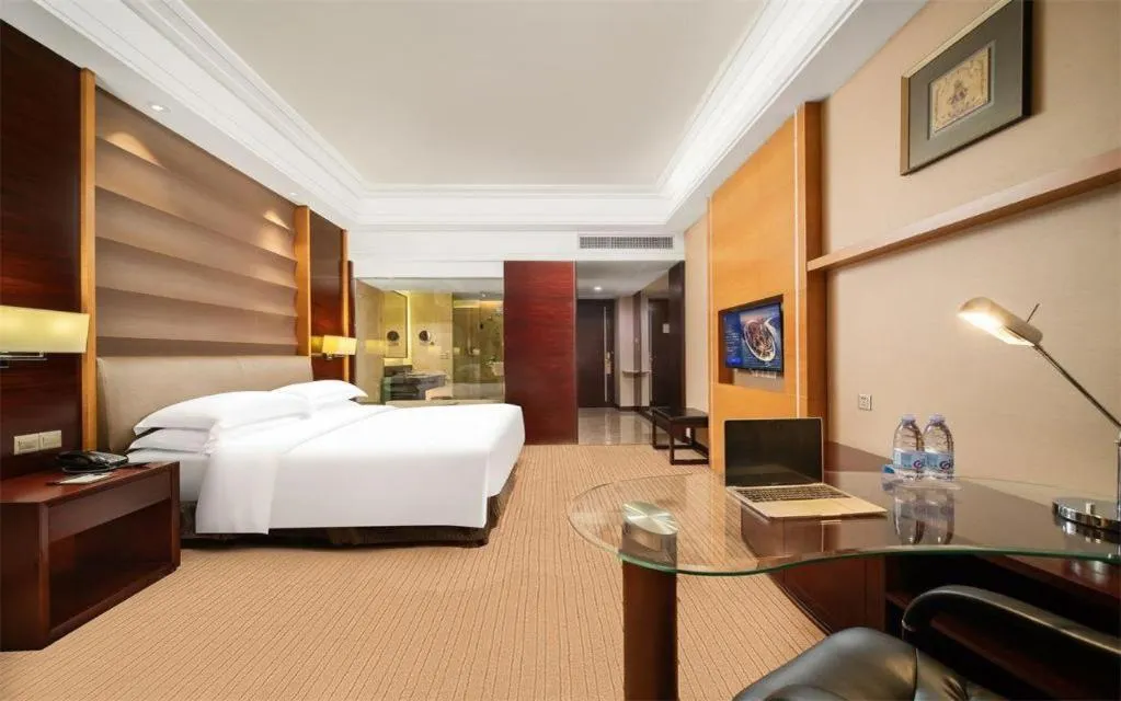 Bed in Venus Royal Hotel Shenzhen International Exhibition Center