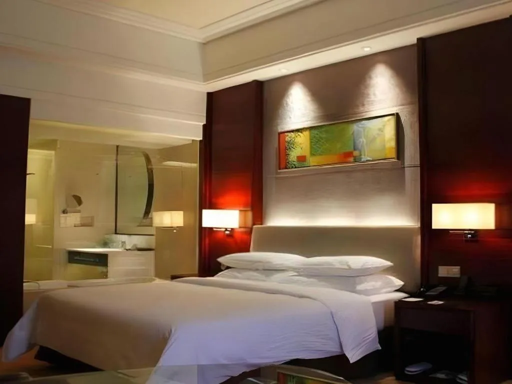 Bed in Venus Royal Hotel Shenzhen International Exhibition Center