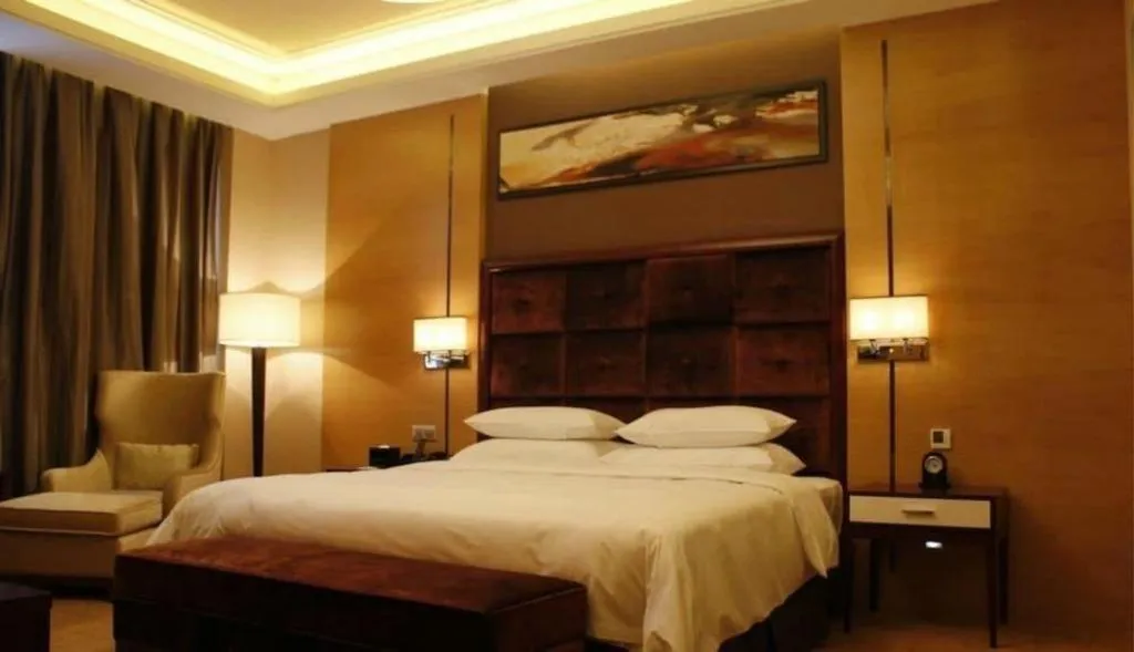 Bed in Venus Royal Hotel Shenzhen International Exhibition Center