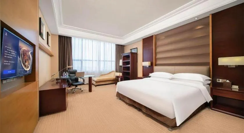 Bed in Venus Royal Hotel Shenzhen International Exhibition Center