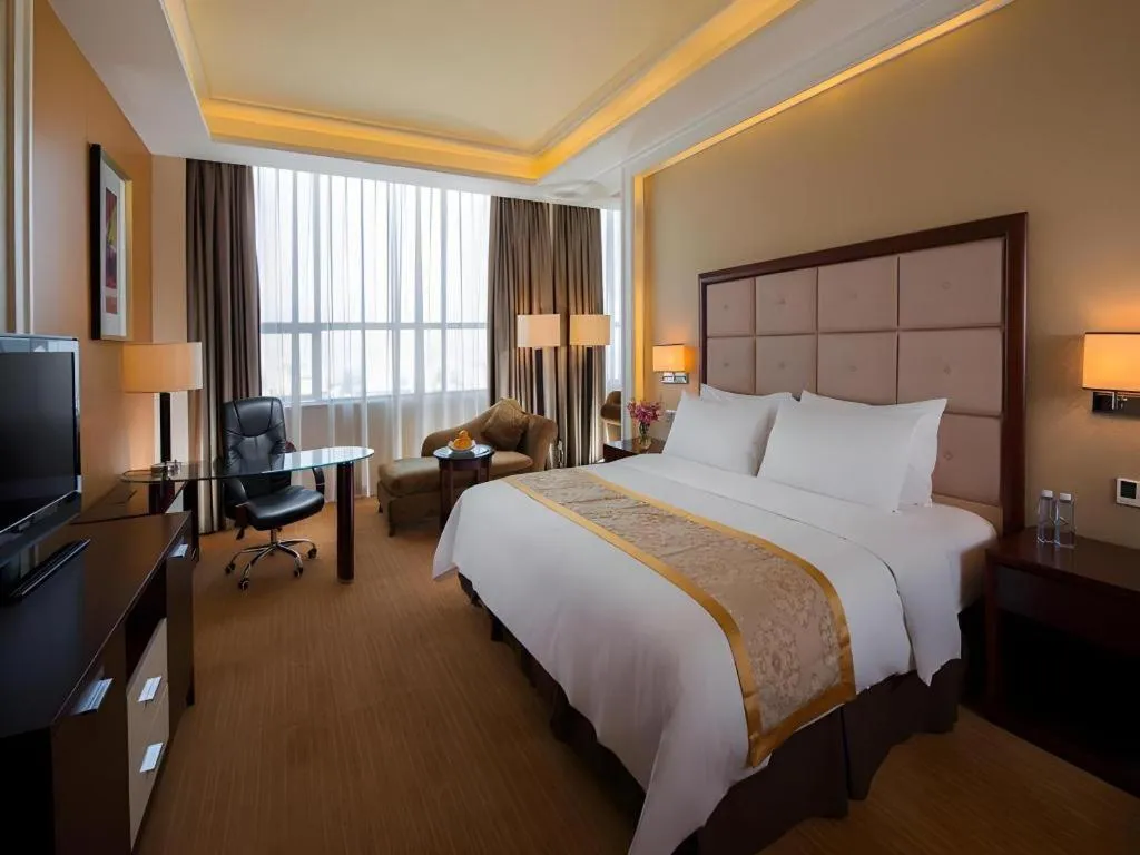 Bed in Venus Royal Hotel Shenzhen International Exhibition Center