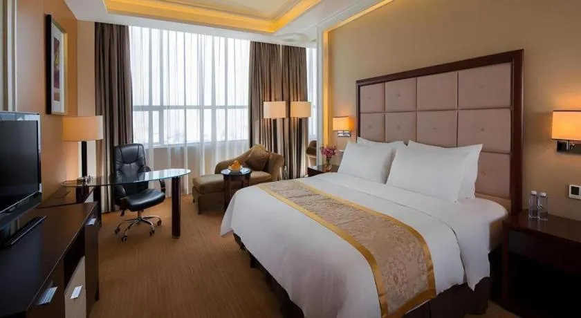 Bed in Venus Royal Hotel Shenzhen International Exhibition Center