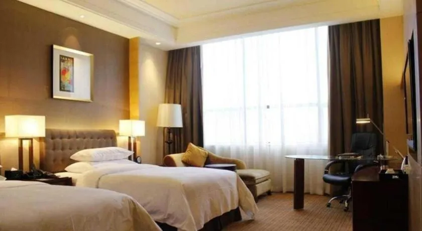 Bed in Venus Royal Hotel Shenzhen International Exhibition Center