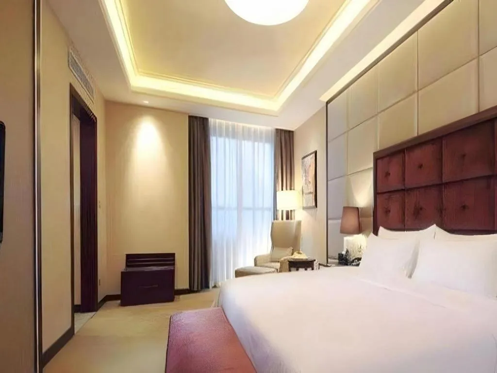 Bed in Venus Royal Hotel Shenzhen International Exhibition Center