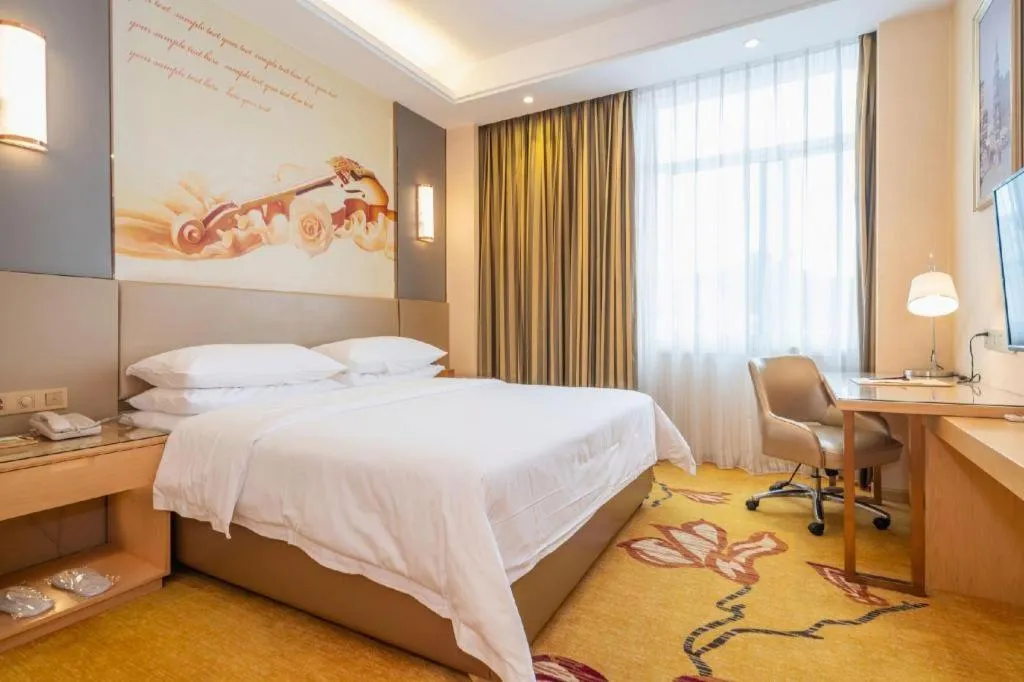 Bed in Vienna Hotel Fuzhou Changle Zhenghe Metro Station