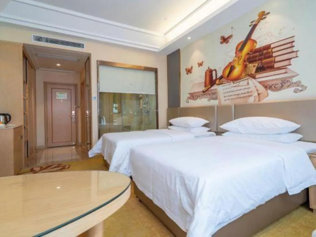 Bed in Vienna Hotel Fuzhou Changle Zhenghe Metro Station