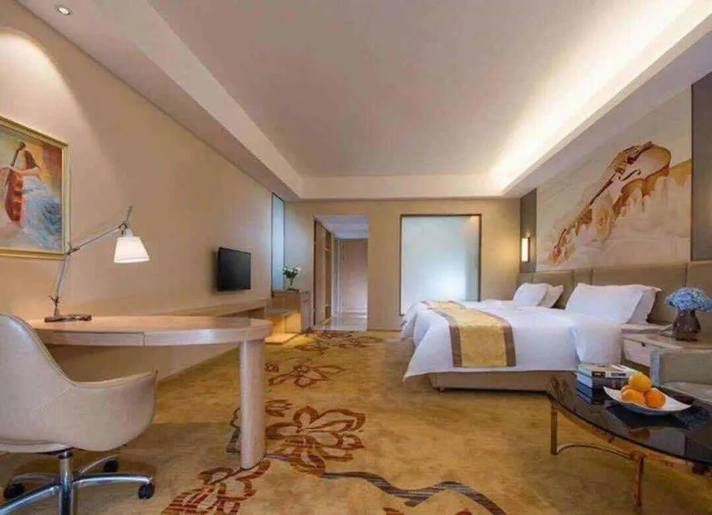 Bed in Vienna Hotel Fuzhou Changle Zhenghe Metro Station