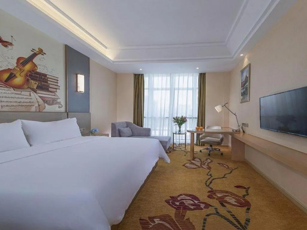 Bed in Vienna Hotel Fuzhou Changle Zhenghe Metro Station