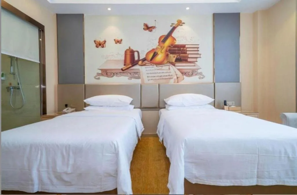 Bed in Vienna Hotel Fuzhou Changle Zhenghe Metro Station