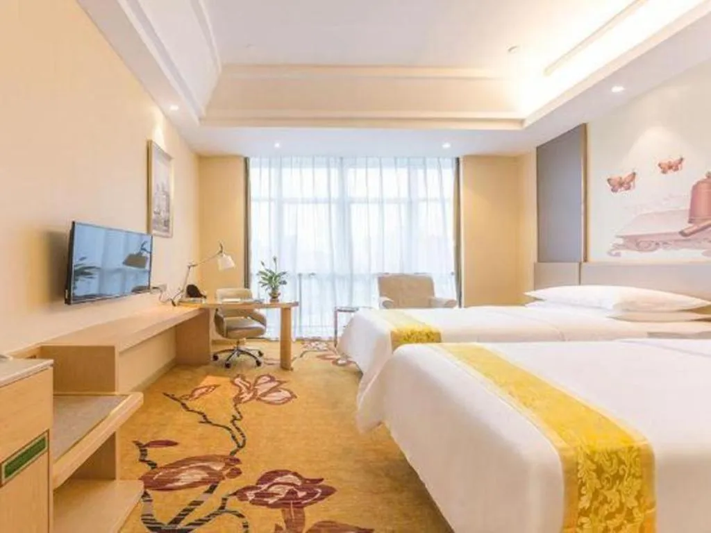 Bed in Vienna Hotel Fuzhou Changle Zhenghe Metro Station