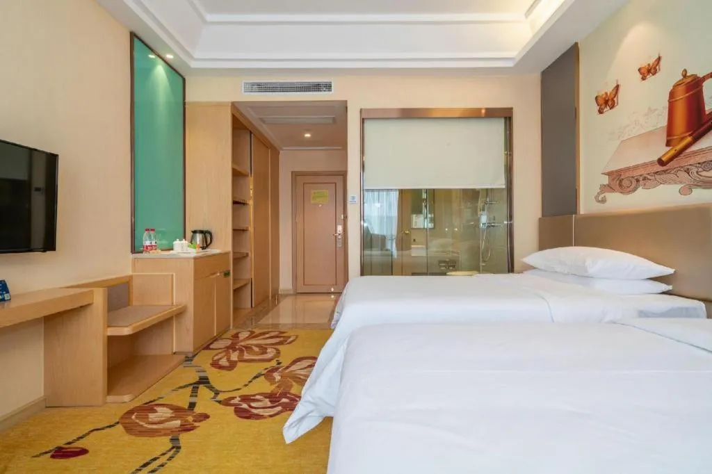 Bed in Vienna Hotel Fuzhou Changle Zhenghe Metro Station