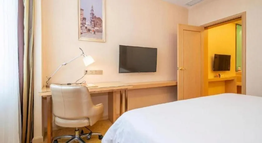 Bed in Vienna Hotel Fuzhou Changle Zhenghe Metro Station