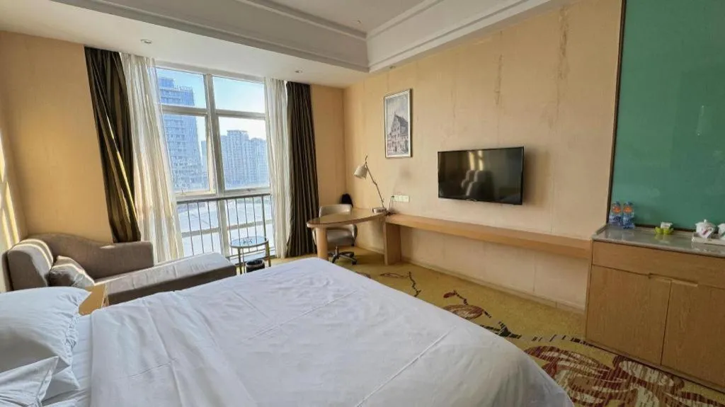 Bed in Vienna Hotel Fuzhou Changle Zhenghe Metro Station