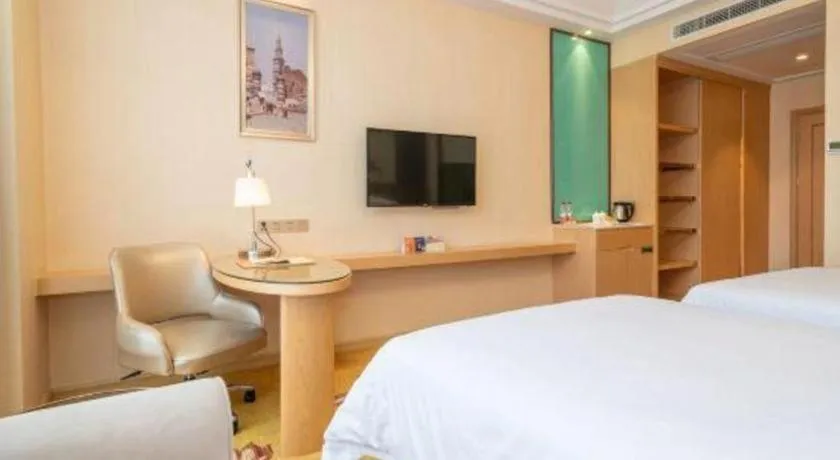 Bed in Vienna Hotel Fuzhou Changle Zhenghe Metro Station