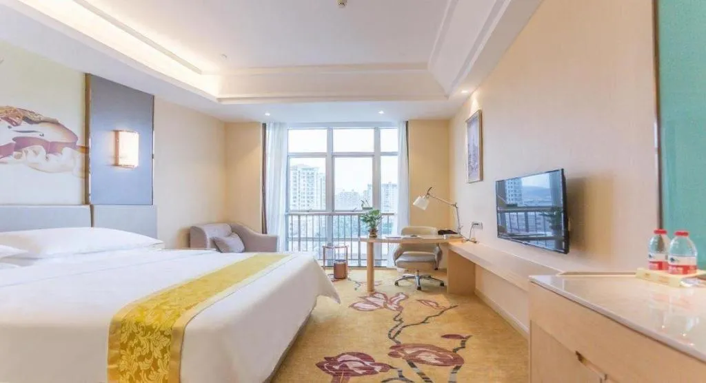 Bed in Vienna Hotel Fuzhou Changle Zhenghe Metro Station