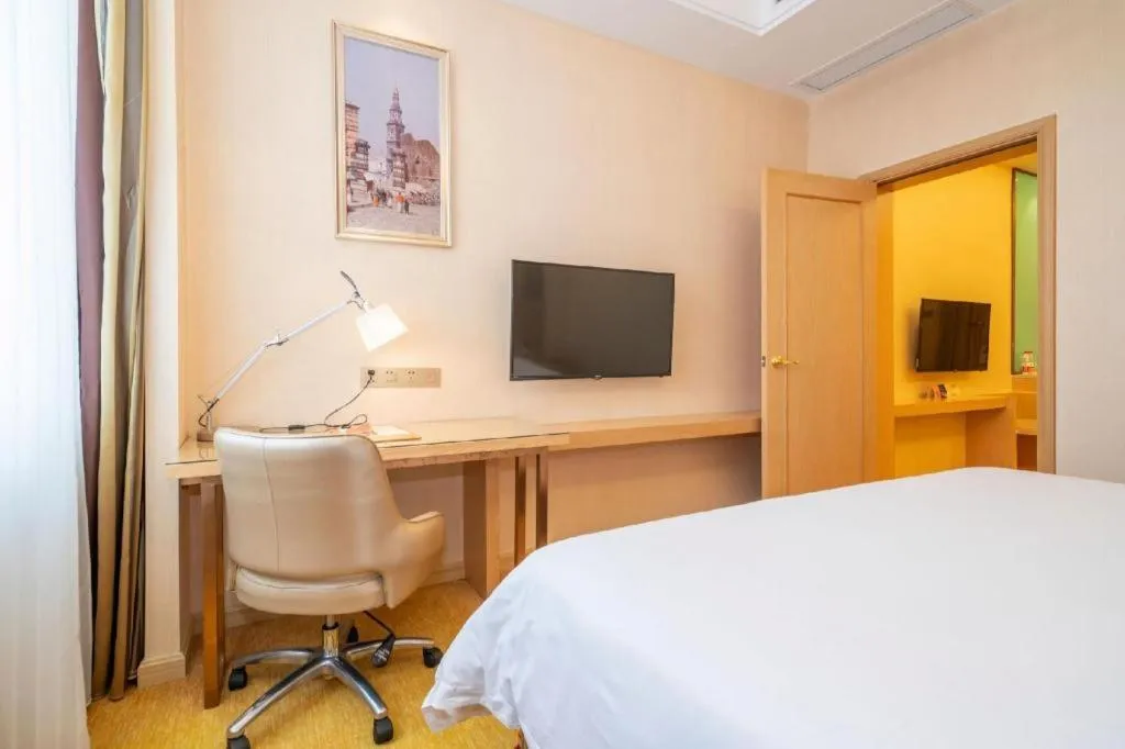 Bed in Vienna Hotel Fuzhou Changle Zhenghe Metro Station