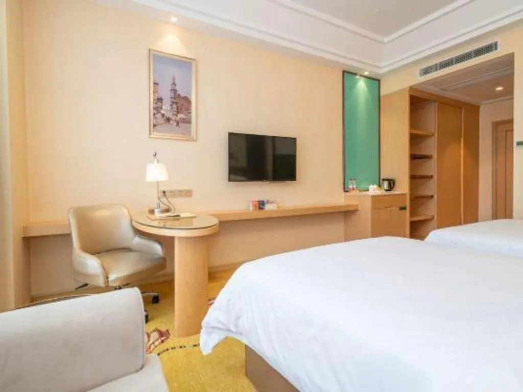 Bed in Vienna Hotel Fuzhou Changle Zhenghe Metro Station