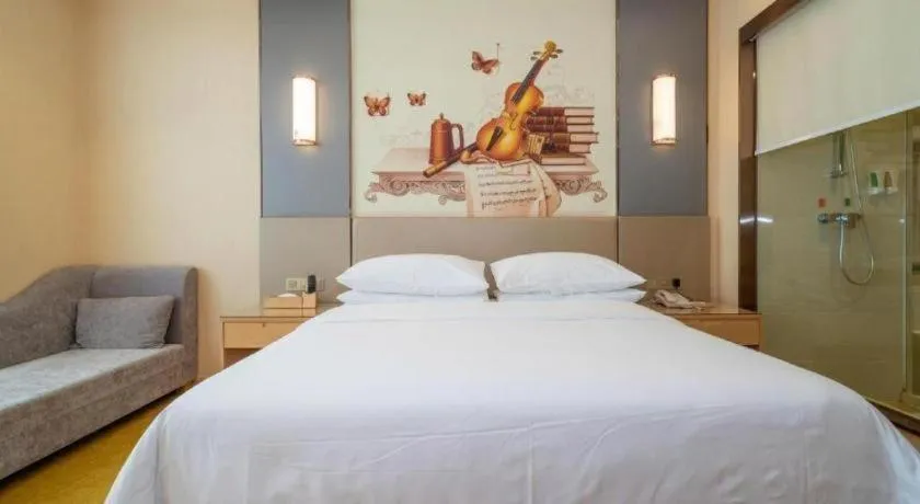 Bed in Vienna Hotel Fuzhou Changle Zhenghe Metro Station