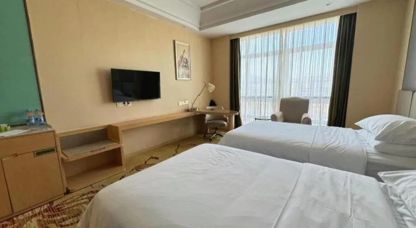 Bed in Vienna Hotel Fuzhou Changle Zhenghe Metro Station