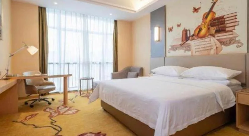 Bed in Vienna Hotel Fuzhou Changle Zhenghe Metro Station