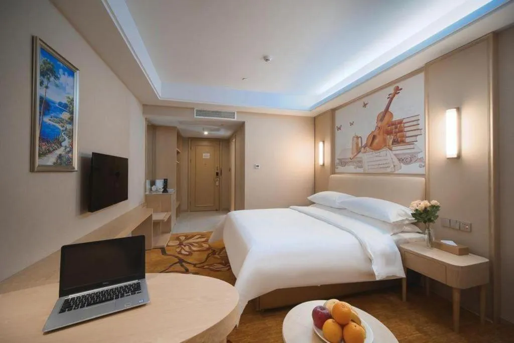 Bed in Vienna Hotel Zhejiang Tongxiang Puyuan