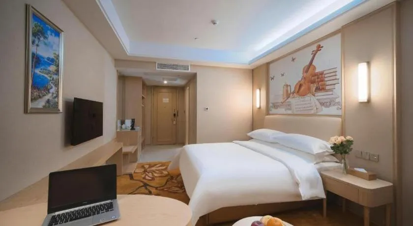 Bed in Vienna Hotel Zhejiang Tongxiang Puyuan