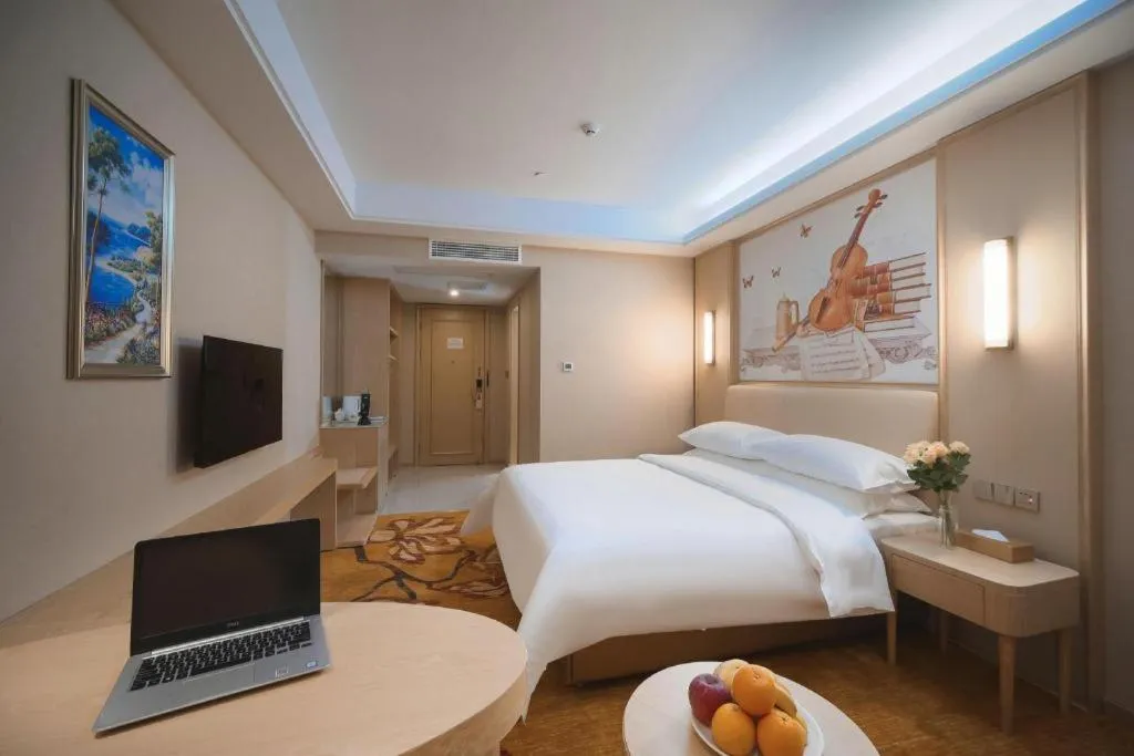 Bed in Vienna Hotel Zhejiang Tongxiang Puyuan