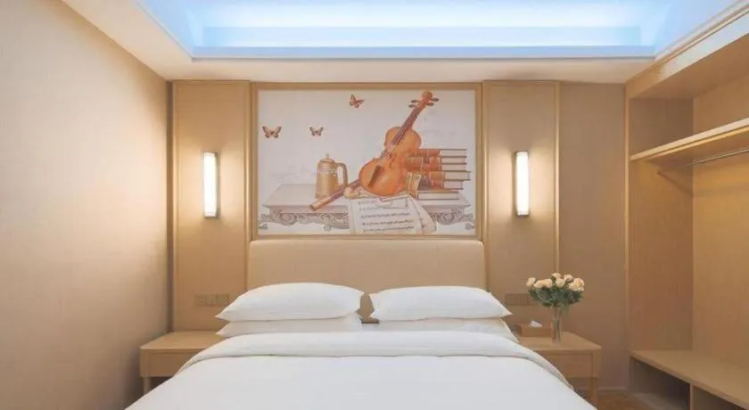 Bed in Vienna Hotel Zhejiang Tongxiang Puyuan