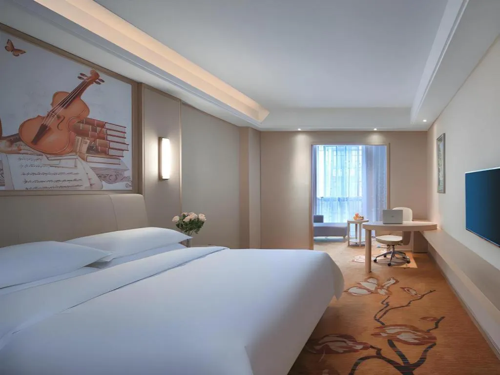 Bed in Vienna Hotel Zhejiang Tongxiang Puyuan