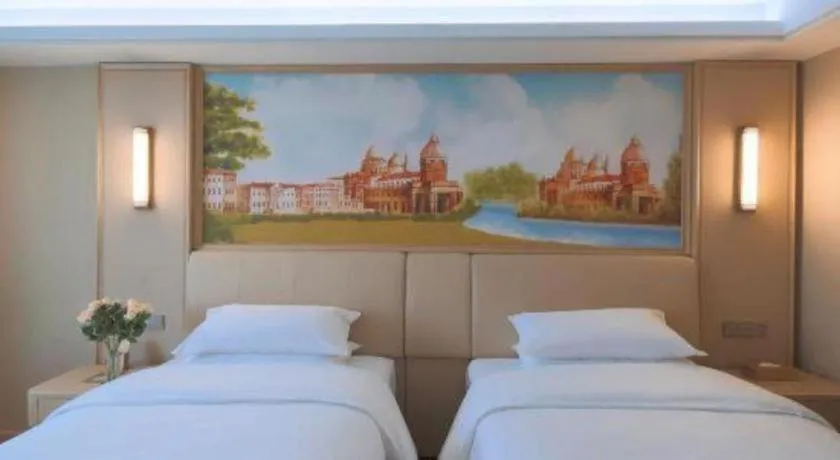 Bed in Vienna Hotel Zhejiang Tongxiang Puyuan