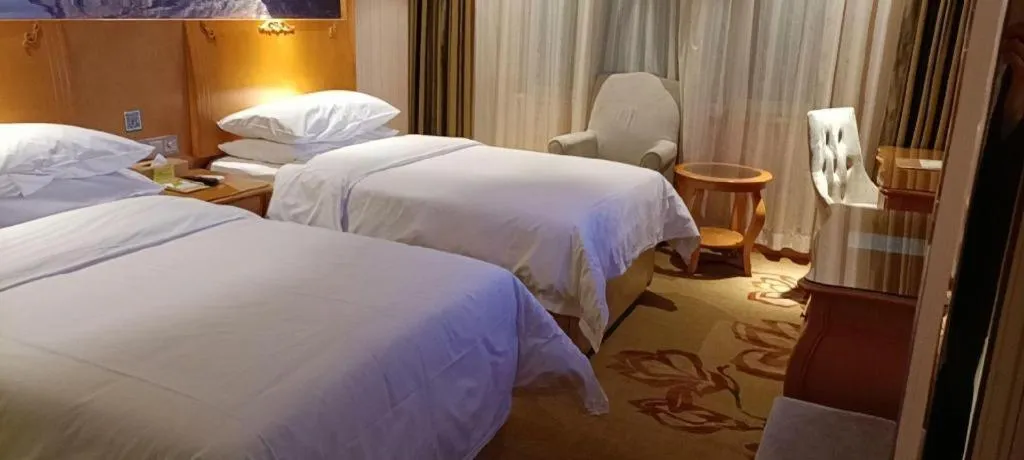 Bed in Vienna Hotel Qinghai Xining Wanda Plaza