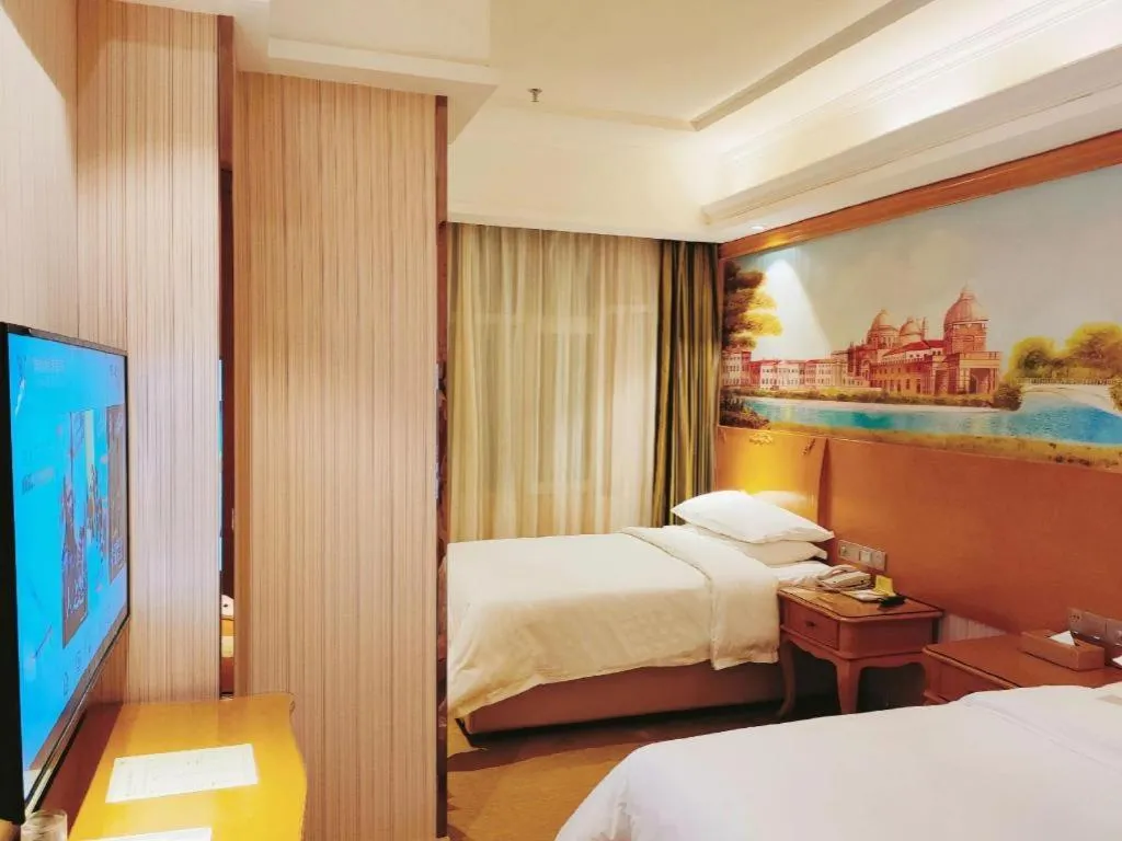 Bed in Vienna Hotel Qinghai Xining Wanda Plaza