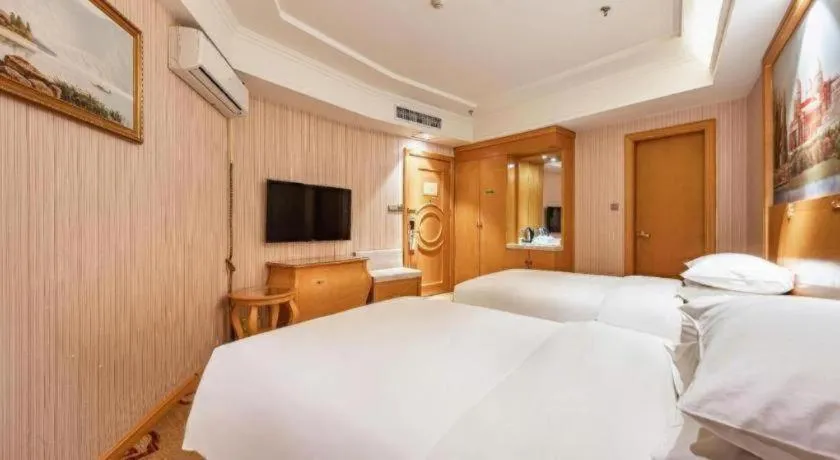 Bed in Vienna Hotel Qinghai Xining Wanda Plaza