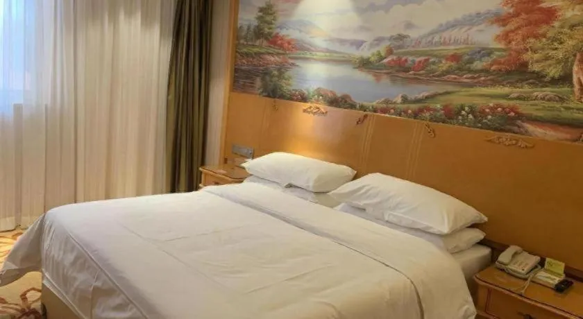 Bed in Vienna Hotel Qinghai Xining Wanda Plaza