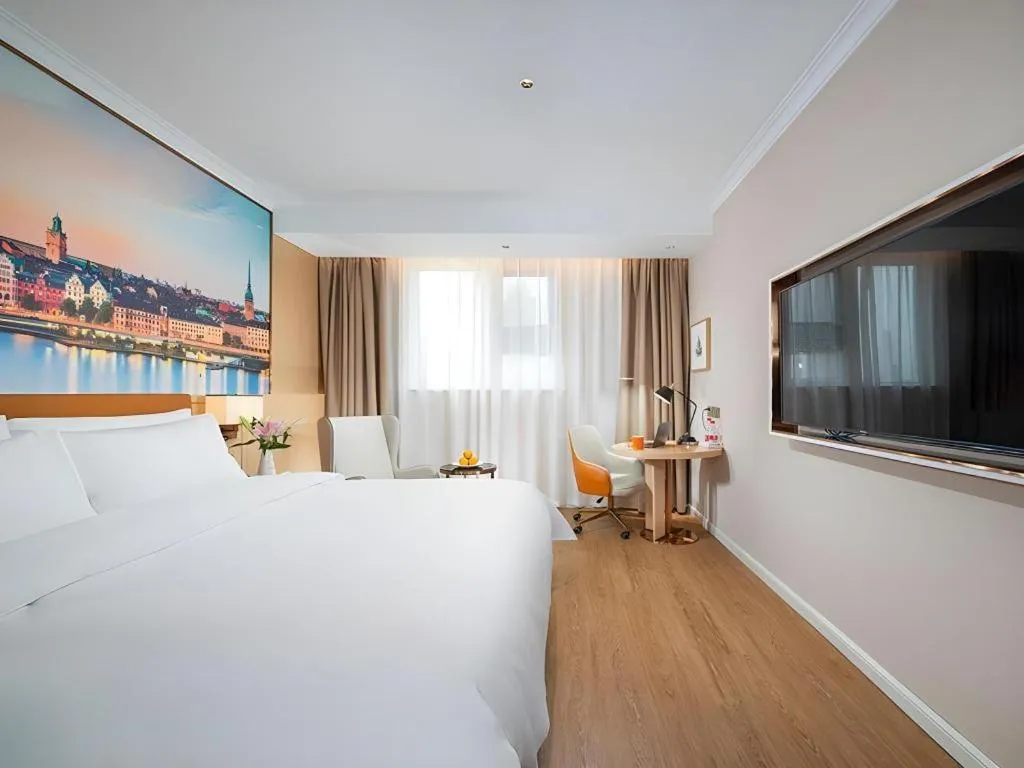 Bed in Vienna Hotel Tianjin Chentangzhuang Metro Station