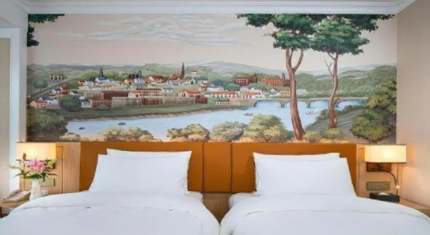 Bed in Vienna Hotel Tianjin Chentangzhuang Metro Station