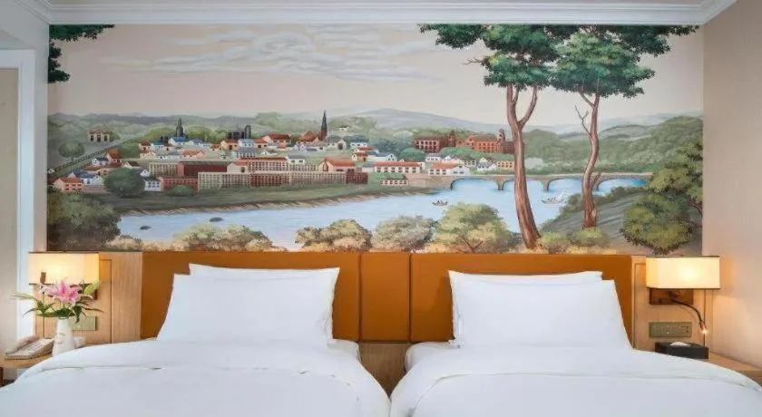 Bed in Vienna Hotel Tianjin Chentangzhuang Metro Station