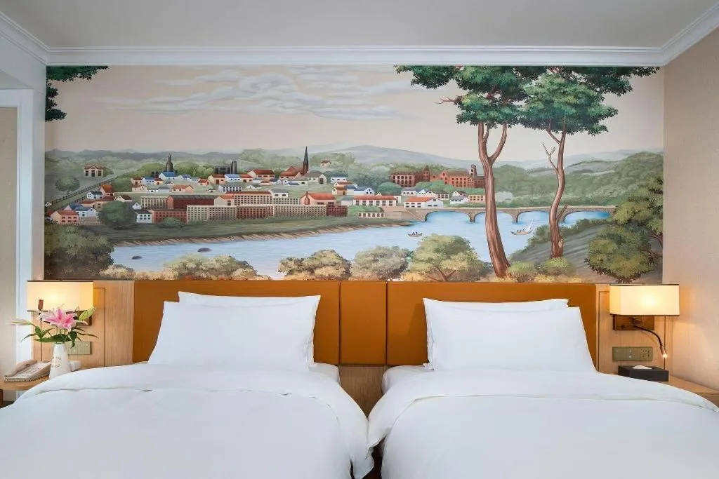 Bed in Vienna Hotel Tianjin Chentangzhuang Metro Station