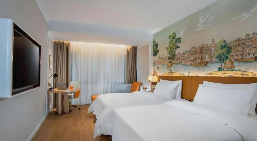 Bed in Vienna Hotel Tianjin Chentangzhuang Metro Station