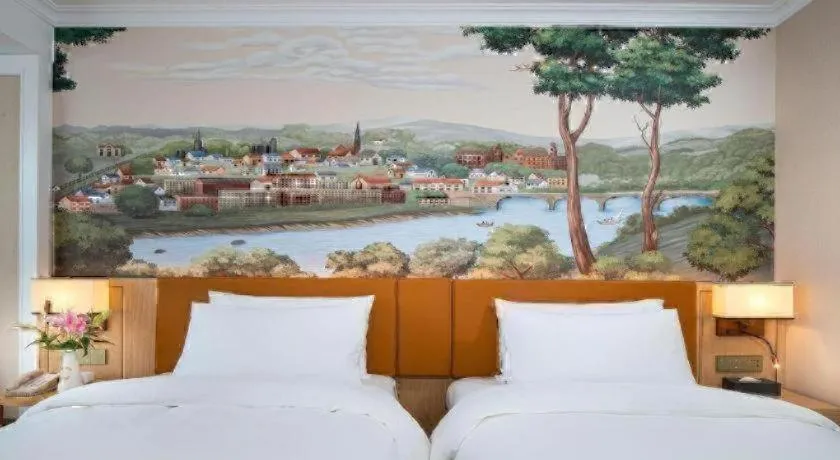 Bed in Vienna Hotel Tianjin Chentangzhuang Metro Station