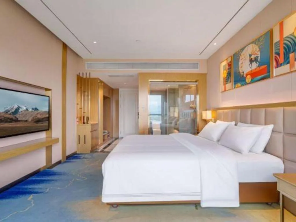 Bed in Vienna Hotel Yunnan Maitreya Huquan