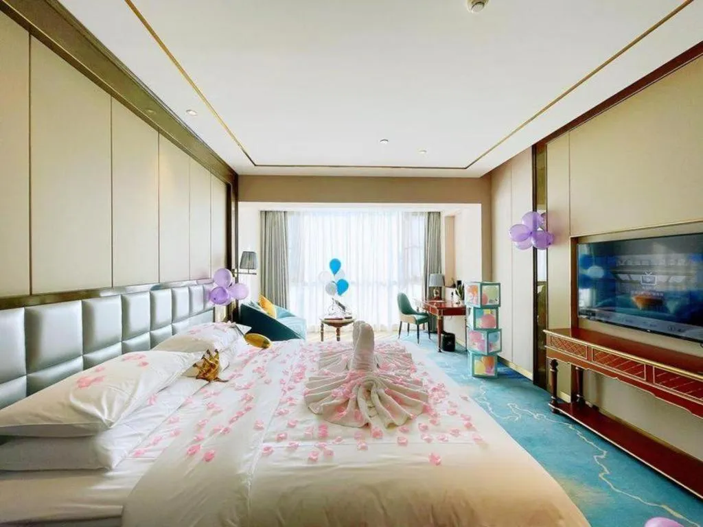 Bed in Vienna Hotel Yunnan Maitreya Huquan