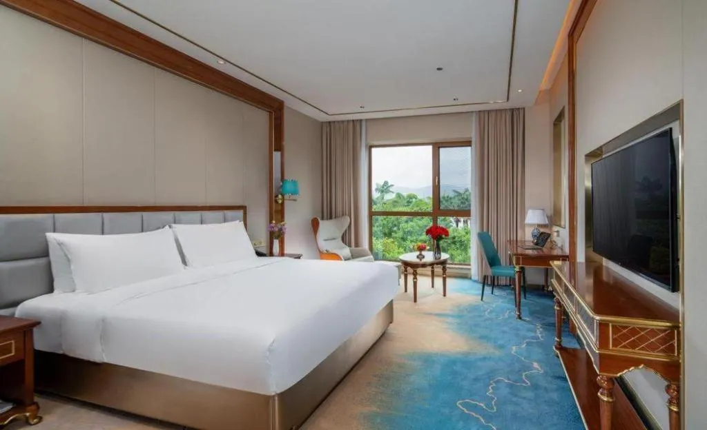 Bed in Vienna Hotel Yunnan Maitreya Huquan