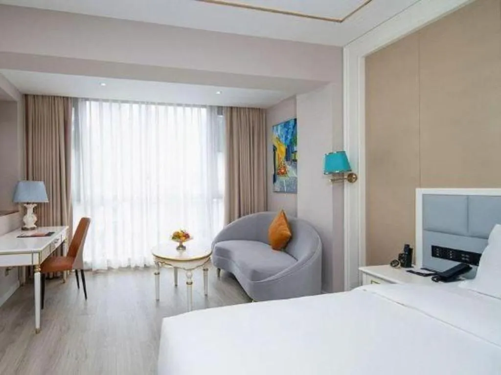 Bed in Vienna Hotel Yunnan Maitreya Huquan